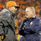 Clemson’s Dabo Swinney, left, and Notre Dame’s Brian Kelly have failed at protecting the interests and well-being of their players.
